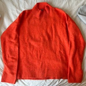 UNIQLO soft orange sweater